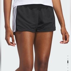 Soft Moisture Managing Shorts With A Body Hugging Fit Casual Striped Sports Shorts, Sporty Bottoms With Three Stripes Branding, Short Length, Sporty Short Bottoms With Three Stripes Branding, Adidas Sporty Bottoms With Contrast Stripes, Athleisure Bottoms With Three Stripes Branding In Short Length, Athleisure Shorts With Three Stripes Branding, Athleisure Bottoms With Three Stripes Branding And Short Length, Athleisure Bottoms With Three Stripes, Short Length, Athleisure Bottoms With Side Stripes