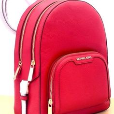 Excellent Condition Classic Red Leather Backpack, Classic Red Standard Backpack, Red Leather Satchel Backpack With Zipper, Luxury Red Bag With Zipper Pocket, Red Leather Backpack With Zipper For Everyday, Red Backpack With Removable Pouch, Luxury Red Leather Backpack, Luxury Red Leather Standard Backpack, Michael Kors Backpack