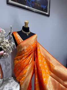 Discover the timeless beauty of our high-quality Banarasi silk saree, perfect for any occasion. The golden zari not only enhances the intricate designs but also gives the saree a shiny, opulent look. It drapes elegantly, ensuring you make a stunning statement at weddings, festivals, and formal events.This saree comes with an unstitched blouse. Banarasi Silk Saree, Intricate Designs, Silk Saree, The Golden, Timeless Beauty, Silk Sarees, Clothing Items, Favorite Outfit, Bathing Beauties