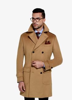 It's the sharpest coat in your closet, so we updated it with the best fabric we could find; cashmere. And as an added bonus, it's cut to fit cleanly over our signature slim-fit suits. . . . Color: Camel Design: Plain Blend: 90% Wool 10% Cashmere Navy Raincoat, Slim Fit Suits, Fitted Suit, Shoulder Shirts, Saint Tropez, Cool Suits, Modern Man, Double Breasted Suit Jacket, Fashion Casual