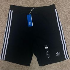 New Adidas Shorts Soft Regular Fit Color: Black / 3 - Stripes White Quality: 100% Cotton Size: Large ( 16 Inches X 21 Inches) Inseam: 10 Inches Front Zip Pockets Drawstring Embroidery Logo (Adidas Trefoil) Free Shipping 2-4 Days Delivery Shorts Adidas, Adidas Trefoil, Adidas Shorts, Black White, Fleece Shorts, Adidas Logo, Embroidery Logo, Adidas Men, Mens Shorts