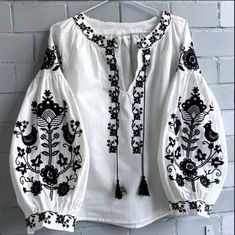 🌷Discover the elegance of our White Embroidered Peasant Blouse, a modern take on the traditional vyshyvanka. This beautifully crafted boho blouse features intricate embroidery that showcases a blend of cultural heritage and contemporary style, making it a must-have addition to your wardrobe. Designed with comfort in mind, this plus-size top offers a flattering fit for all body types. With its versatile design, this blouse can be dressed up or down, making it ideal for casual outings, festivals, or even as a stylish work piece. - Elegant white fabric with exquisite embroidery - Modern women's vyshyvanka design - Plus size options available for a perfect fit - Flowy silhouette for comfort and style - Great as a thoughtful gift for birthdays, holidays, or special occasions Embrace your uniqu Boho Chic Plus Size, Embroidery Modern, Chic Plus Size, Womens Blouses, Boho Blouse, Intricate Embroidery, Plus Size Top, Peasant Blouse, Cultural Heritage