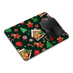 a computer mouse pad with christmas decorations on it