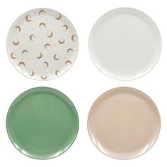 three plates with different designs on them, one is green and the other is white