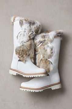 You'll revel in winter weather when you get to wear the Sira boots, handcrafted from leather and soft rabbit fur in Northern Italy. Built to keep you cozy warm in temps as low as -4°F with their 100% wool footbeds and insulating lining, these snow-proof and water-resistant boots feature decorative leather lacing and an abundance of plush fur trim. Robust synthetic nonskid outsoles provide traction on ice and snow. Bulky Winter Boots, Luxury Winter Knee-high Boots With Snip Toe, Winter Heels Shoes 2022, Luxury Women's Winter Wedge Boots, Stylish Winter Boots 2022, Winter Thigh Boots, Luxury Round Toe Boots With Laces, Luxury Women's Wedge Boots For Winter, Luxury Knee-high Boots With Snip Toe For Winter