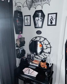 a halloween themed room with black and white decor