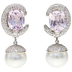 Kunzite, diamond and pearl earrings in 18k white gold feature significant kunzites weighing 10.31 ctw and 2.22 ctw of brilliant cut diamonds. 15mm wide x 35mm wide Diamond Pearl Earrings, Kunzite Jewelry, Pearl Diamond Earrings, Jewellery Diamond, White Pearl Earring, Pearl And Diamond Earrings, Gold Diamond Earrings, Earrings Pearl, Antique Earrings