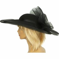 This is a black wool wide brim hat dating to the glamorous 1980s.  It has a low rounded crown and is decorated with “horsehair” braid in a flower shape at the back of the crown, with a grosgrain ribbon centre.  The edge of the brim is also covered with horsehair braid netting.  Horsehair, of course, is not real horsehair, but a millinery term for this type of netting.  The hat has a spaghetti strap that would aid in keeping the hat in place.  It is a difficult hat to size as it sits on top of th Pink Pillbox Hat, Pure Silk Dress, Classy Hats, Ladies Hats, Pearl Jewels, Elegant Hats, Wide Brimmed Hats, Horse Hair, Brim Hat