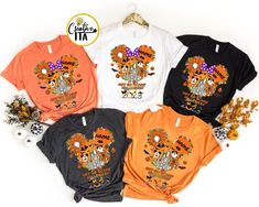 four t - shirts with the words happy halloween written on them in different colors and designs