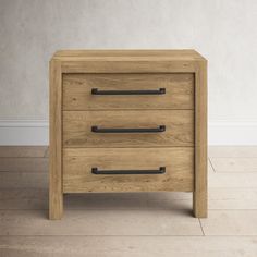 a wooden nightstand with two drawers and black handles on the bottom drawer, against a white wall