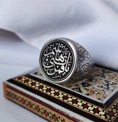 Engraved Sterling Ring | Written Ya Qamar Bani Hashim | Engraved On Sterling Silver 925 Ring | Turkish Style Ring Description: Style: Engraved Written As (YA QAMAR BANI HASHIM) Ring: Shia Ring | Muslim Ring Color: Black Metal: Sterling Silver 925 Handmade: Yes, handmade artisan ring Will be Shipped Via FedEx Intl Priority Service. No Custom duty will be charged by our customers. Customer Policy: Your satisfaction is our priority. We guarantee you our products quality exceed its real value. All y Symbolic Engraved Gemstone Ring As Gift, Symbolic Silver Signet Ring For Wedding, Spiritual Silver Signet Ring For Wedding, Traditional White Gold Rings With Polished Finish, Silver Hallmarked Engraved Ring As Gift, Hallmarked Silver Engraved Ring For Gift, Traditional Silver Rings For Gift, Traditional White Gold Sterling Silver Signet Ring, Traditional Silver Engraved Ring With Polished Finish