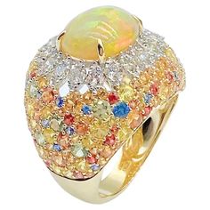 NWT 9, 009 Rare 18KT Fancy Large Glittering Opal Rainbow Sapphire Diamond Ring For Sale at 1stDibs | rare opal, opal rainbow rare Extravagant Rings, Female Rings, Colored Sapphires, Yellow Gold Opal Ring, Blue Sapphire Diamond Ring, Expensive Rings, Rainbow Ring, Cognac Diamonds, Genie Bottle