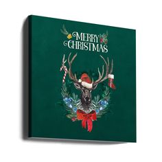 a green christmas card with an image of a deer's head and antlers