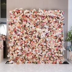 a large floral wall in the middle of a room