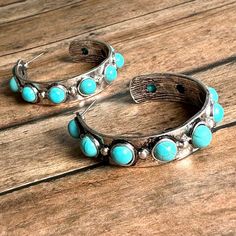 "Western Style Cowgirl Turquoise and Antique Silver Hoop Earrings Earrings measure 1 3/4\" x 3/8\". Matching bracelet sold separately." Southwestern Style Adjustable Hoop Jewelry, Southwestern Adjustable Hoop Jewelry, Turquoise Metal Round Hoop Earrings, Nickel-free Turquoise Metal Hoop Earrings, Southwestern Turquoise Nickel-free Hoop Earrings, Turquoise Southwestern Nickel-free Hoop Earrings, Southwestern Turquoise Hoop Earrings Nickel Free, Turquoise Southwestern Hoop Earrings, Turquoise Metal Hoop Jewelry