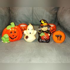 halloween decorations are sitting on a couch