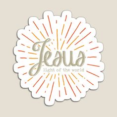 a sticker with the words jesus light of the world in orange and white on it