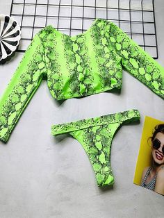 Sku CY-!29312 Material Chinlon Style Bralette , Padded Feature Neon Occasion Beach , Hot Springs , Swimming Pool Type Bikini Swimsuit Color FLUORESCENT GREEN Size S,M,L Size chart: Please consult the size chart we provide for this item's measurements to help you decide which size to buy. Please note: There may be 1-3cm differ due to manual measurement. CMINCH Cm Cup Bust Waist Hips S A-B 70-80 66-76 86-91 M B-C 74-85 70-80 91-96 L C-D/E 78-90 74-84 96-101 Fitted Long Sleeve Green Swimwear, Green Long Sleeve Swimwear For Beach, Green Long Sleeve Beachwear Swimwear, Green Summer Tankini For Party, Green Summer Party Tankini, Summer Party Green Tankini, Green Long Sleeve Swimwear For Poolside, Green Swimwear For Spring Party, Green Fitted Tankini For Party