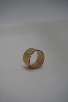 This simple yet bold ring is stunning on its own or layered. The cigar style is classic and timeless. Materials: 14k Gold Fill, Sterling Silver Measurements: This band measures 12 mm wide Classic Wide Band Promise Ring, 14k Gold Wide Band Promise Ring, Classic Wide Band Ring For Promise, 14k Gold Wide Band Ring For Promise Ring Event, Timeless 14k Gold Wide Band Ring With Open Band, Timeless 14k Gold Wide Band Ring With Open Design, Classic Open Band Wide Promise Ring, Classic Wide Band Open Promise Ring, Timeless Wide Band 14k Gold Open Ring