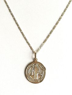 "18K GOLD FILLED SAINT BENEDICT NECKLACE 20\" LONG...FOR GOOD LUCK ,PROSPERITY AND PROTECTION. PENDANT : 25 mm 18K GOLD FILLED CADENA DE SAN BENITO 20\" LARGO ..PARA PROSPERIDAD, BUENA SUERTE Y PROTECCION. DIJE: 25 mm" Gold Sterling Silver Chain Necklace Nickel Free, Nickel-free Yellow Gold Medallion Necklace, Gold Round Charm Necklaces For Good Luck, Gold Engraved Charm Necklace For Good Luck, Gold Good Luck Charm Necklace Nickel Free, Gold Nickel-free Charm Necklaces For Good Luck, Gold Nickel-free Charm Necklace For Good Luck, Nickel-free Gold-plated Yellow Gold Necklace, Nickel-free Yellow Gold-plated Necklace