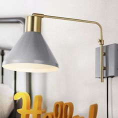 a lamp that is on the side of a wall