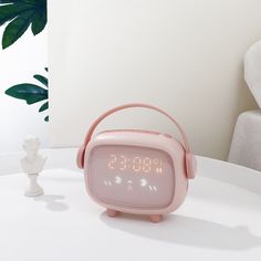 Uncover the versatile features of our digital LED alarm clock, model XR-MM-C2002, meticulously designed to cater to your ‍varied needs. It displays time accurately, coupled with a thermometer function and a luminescent display. Effortlessly⁢ set the‍ alarm, countdown, and calendar features to suit⁢ your routine. The ‌24-hour ‍indicator, along ‌with a ⁤week and month‌ display,⁢ empowers you to stay on top of your schedule.Boasting an inviting ​rectangular ⁣visual appeal, this clock has ‍a sleek thickness of 3mm or less, ensuring ⁣it adds a touch of charm to any room. Crafted ‌from durable ​ABS​ material,‌ it has a gleaming​ glass mirror and a PVC dial‍ that adds⁤ to its eye-catching aesthetics.This digital⁤ clock is⁣ available in​ refreshing shades of green, blue, ⁢and pink. It&apos;s suita Clock Sound, Birthday Gift For Boys, Bedroom Clocks, Kids Alarm Clock, Light Alarm Clock, Led Alarm Clock, Wine Tote Bag, Countdown Timer, Gift For Boys