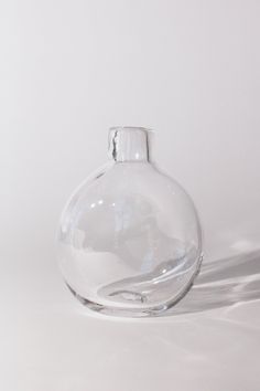 FRAMA-Clear-Round-Glass-Bottle-Shop-Sommer Serving Pitchers & Carafes, Clear Vase, Glass Carafe, Clear Glass Vases, Circle Shape, Glass Cup, Cut Flowers, Glass Bottle, Vases Decor