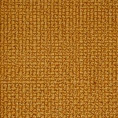 an orange fabric textured with some sort of woven material that looks like it has been woven