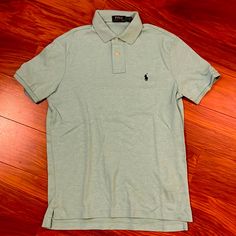 Polo Ralph Lauren Men’s Turquoise/Sea Green Color Polo, Size Small. Never Even Worn, Euc. Picture Doesn't Show The Richness Of The Color, Its A Richer Turquoise Color, The Pic Makes It Look More Washed Out Than It Really Is. Fitted Light Blue Casual Polo Shirt, Casual Light Blue Polo Shirt, Casual Light Blue Cotton Polo Shirt, Light Blue Casual Polo Shirt, Light Blue Casual Cotton Polo Shirt, Vintage Green Cotton Polo Shirt, Green Polo Collar Sporty T-shirt, Ralph Lauren Summer Polo Collar T-shirt, Sea Green Color