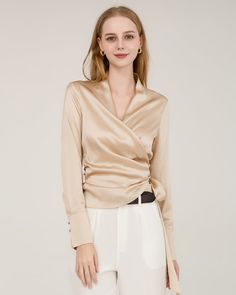 Type: Women's silk shirt.Material: 22 Momme Luxury Mulberry Silk. Features: Satin, wear-resistant and stylish.Details: Classic Solid Color, Designed Long Sleeves, Regular Fit. Prepare to make a statement with our Silk Long-Sleeve Wrap Shirt – a true embodiment of sophistication. Crafted from the finest silk, this shirt not only epitomizes luxury but also captivates with its pleats and tie-belt detailing. Wrap yourself in the delicate folds of this shirt, and feel the luxurious caress of silk aga Silk Blouse Outfit Classy, Project 333, How To Wash Silk, Silk Bonnet, Silk Sleepwear, Silk Accessories, Wrap Shirt, Blouse For Women, Luxury Silk