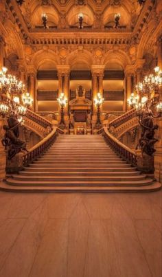 an ornate building with stairs and chandeliers in the center is featured for princess castle