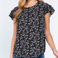 Floral Print Blouse With Ruffle Sleeve Flutter Sleeve Top With Floral Print For Work, Floral Print Ruffle Sleeve Top For Work, Workwear Tops With Floral Print And Ruffle Sleeves, Black Ruffle Sleeve Blouse For Spring, Feminine Black Floral Print Top, Feminine Black Blouse, Black Summer Tops With Ruffle Sleeves, Black Ruffle Sleeve Top For Summer, Black Flutter Sleeve Tops For Spring