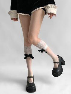 Elevate your summer wardrobe with these elegant lace-trimmed stockings featuring a delicate bowknot detail. Perfect for adding a touch of femininity to any outfit, these socks are made from lightweight, breathable fabric, making them ideal for warm weather.   Please note that this product includes only one pair of stockings. Party Legwear With Lace Trim, Party Lace Legwear With Lace Trim, Lace Trim Hosiery, Spring Thigh-high Legwear With Lace Trim, Spring White Lace Legwear, White Lace Legwear For Spring, Spring Party Lace Hosiery, White Lace Hosiery, Elegant White Lace Trim Stockings