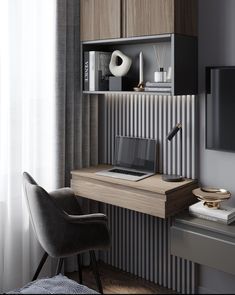 a laptop computer sitting on top of a wooden desk next to a chair in front of a window