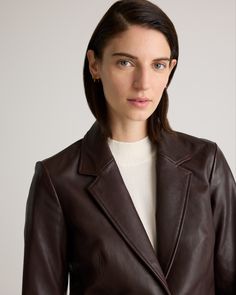 Introducing the ultimate statement piece - our sleek and stylish Leather Blazer. Crafted from the finest, 100% top grain sheep leather, this blazer is the epitome of luxury and sophistication. With its classic cut and timeless design, it's the perfect choice for any occasion, from a casual night out to a formal event. Meet the best way to elevate your style and add a touch of luxury to your wardrobe. Read more about what makes our leather special in our Leather 101 guide.  | Quince | Women's Bla Luxury Semi-formal Fall Blazer, Luxury Tailored Leather Jacket For Semi-formal Occasions, Elegant Fitted Leather Jacket With Leather Lining, Timeless Fitted Leather Jacket, Fitted Timeless Leather Jacket, Luxury Fall Blazer For Formal Occasions, Formal Brown Leather Jacket, Luxury Formal Blazer For Fall, Brown Leather Business Blazer