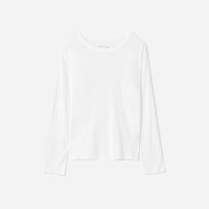 For a little extra coverage—even in the heat. The Long-Sleeve Air Tee is cut with a loose relaxed fit and is made of super-light cotton making it an easy warm-weather staple. Women's Air Long-Sleeve T-Shirt by Everlane in White Effortless Relaxed Fit Top With Shirttail Hem, Effortless White Long Sleeve Top, White Long Sleeve Effortless Top, Relaxed Everyday Tops For Fall, Effortless Crew Neck Tops For Fall, Relaxed Fit Tops For Layering, Effortless Cotton Shirttail Hem Top, Effortless Cotton Top With Shirttail Hem, Effortless Relaxed Fit Tops For Everyday