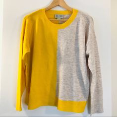 Cozy Up For A Movie Night With This Absolutely Adorable Knit Half Yellow, Half Neutral Oatmeal Pullover Sweater By Anthropologie’s Saturday Sunday. There Are Spots Of Darker Thread Throughout. 70% Polyester, 27% Nylon, 3% Spandex Hand Wash Long Sleeves Boxy Oversized Slouchy Color Block Vertical Stripes Crew Neck Knit Pullover Not Exact, Flat: B 24.5” Standard: 23.5" - 24”L Oatmeal Ecru Tan Beige Sand Yellow Mustard Dijon Pineapple Ribbed Hem Lowest Price Listed Final Sale Offers Ignored Ty Yellow Knit Sweater, Yellow Knit, Yellow Mustard, Anthropologie Sweater, Color Block Sweater, Saturday Sunday, Knit Pullover, Vertical Stripes, Knitted Pullover