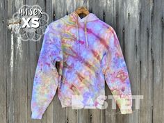 "READY TO SHIP XS Watercolor Style Ice Dyed Pullover Hoodie - Áine Hand dyed with fiber reactive procion dyes. This comfy pullover hoodie is 80% cotton/ 20% poly. Has pouch style pocket on front. Approximate Measurements: Length - 23\" Width (armpit to armpit) - 17\" Sleeve Length - 23\" This sweatshirt is a fitted style, please refer to the measurements to make sure this item will fit properly. If you need help finding your measurements, measure a sweatshirt, that you already love the fit, layi Spring Acid Wash Hand Dyed Hoodie, Relaxed Fit Tie Dye Hoodie, Cotton Tie-dye Hoodie For Spring, Tie Dye Cotton Hooded Hoodie, Casual Tie-dye Sweatshirt With Drawstring Hood, Tie-dye Hoodie With Drawstring Hood, Ice Dyeing, Pullover Hoodie, Hand Dyeing