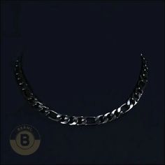 Designed for the stylishly sturdy, the Benjamin Stainless Steel Figaro Chain Necklace effortlessly marries flair with durability. This chain is your all-weather companion, ready to add character to your every look, be it a formal soirée or a laid-back hangout. The Benjamin is where fashion meets function, and every day is an opportunity to showcase your suave and spunky side. Specifications: Metal: Stainless Steel Color: Black Finish: Polished When it comes to men's necklaces, stainless steel brings strength, shine, and street cred to the table. Stainless Steel necklaces interlock metal rings, discs, or beads in badass textures perfect for the modern man. From chunky Cuban links with an edgy urban appeal to low-key beads that let pendants pop, the BERML stainless chains have range. There's Black Stainless Steel Chain Link Necklace, Black Cuban Link Stainless Steel Chain Necklace, Black Cuban Link Stainless Steel Necklace, Black Figaro Chain Necklace Gift, Black Figaro Chain Necklace As Gift, Black Figaro Chain Necklace For Gift, Black Stainless Steel Cuban Link Chain Necklace, Gunmetal Link Chain Necklace In Stainless Steel, Gunmetal Stainless Steel Chain Necklace