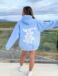 The World Is a Better Place With You In It Light Blue Retro Hoodie.  This unisex heavy blend hooded sweatshirt is relaxation itself. Made with a thick blend of cotton and polyester, it feels plush, soft and warm, a perfect choice for any cold day. In the front, the spacious kangaroo pocket adds daily practicality while the hood's drawstring is the same color as the base sweater for extra style points. .: 50% cotton, 50% polyester .: Medium-heavy fabric (8.0 oz/yd² (271 g/m .: Classic fit .: Tear Blue Long Sleeve Hoodie With Text Print, Blue Winter Sweatshirt With Slogan, Casual Light Blue Hoodie With Letter Print, Light Blue Letter Print Winter Hoodie, Blue Crew Neck Hoodie With Letter Print, Light Blue Hoodie With Letter Print For Winter, Winter Light Blue Hoodie With Letter Print, Blue Hooded Sweatshirt With Letter Print, Light Blue Long Sleeve Hoodie With Letter Print