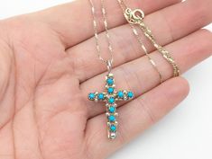 Please note we will have delayed shipping in early December. Orders placed from now until Thursday, December 12th will ship on Friday, December 13th. These orders should arrive between December 19th and December 21st. A beautiful vintage petit point sterling silver cross studded with turquoise stones on one side and red coral on the other. Excellent condition with a light golden patina. Comes on a 24" sterling silver twisted singapore chain. Just want the pendant or need a different chain or len Cord Necklaces, Silk Cord Necklace, Types Of Gifts, Unique Packaging, Gold And Silver Rings, Silk Cord, Turquoise Stones, Sterling Silver Cross, Coral Turquoise