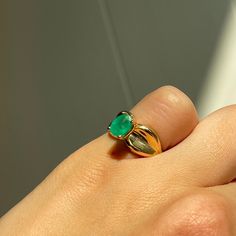 Estate/ vintage 14KT yellow gold ring with genuine, oval cut, emerald and concave wide band. Prong set emerald, and glue has been added to stabilize the stone. Great piece as an engagement/anniversary piece or even as a pinky ring due to its current size. Size 5 Can be resized for an additional fee Weight: 3.2 grams 9mm wide band, tapered back Genuine, bright green, oval-cut emerald measures: 7mm x 4.95mm Abrasions to the stone Estimated 1.00 carat genuine, emerald Stamped 14K and hallmarked Saint Jewelry, Wide Band Ring, Green Oval, Band Design, Wide Band Rings, Fabric Ribbon, Engagement Anniversary, Pinky Ring, Yellow Gold Ring