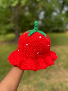 Red strawberry hat with a green stem and white heart shaped seeds! Strawberry Bucket Hat Crochet, Crochet Bucket Hat Free Pattern, Easy Crochet Bucket Hat, Strawberry Bucket Hat, Strawberry Hat, Bucket Hat Crochet, Crochet Bucket, Crochet Bucket Hat, Red Strawberry