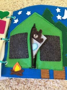 a cake made to look like a camper's tent with the door open