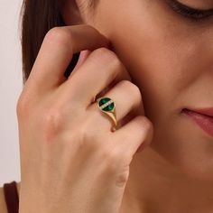 Radiate sophistication with our Green Enamel Line Pave Signet Ring. The surface of the ring finished with green and decorated with sparkling line, creating a modern yet timeless aesthetic. This versatile piece effortlessly elevates any style, making it a must-have for those who seek a touch of sophisticaiton and a pop of color in their accessories. - Made in 14k solid gold - Decorated with handset white cubic zirconia stone - Finished with Green Enamel - Band Width: 1.55 mm / 0.06 inches -Top Wi Modern Green Emerald Diamond Ring, Modern Green Diamond Ring For Formal Occasions, Elegant Green Emerald Cut Signet Ring, Luxury Green Channel Set Rings, Modern Enamel Ring For Anniversary, Elegant Green Signet Ring For Anniversary, Green Diamond Channel Set Rings, Elegant Green Signet Ring For Wedding, Luxury Emerald Rings Channel Set