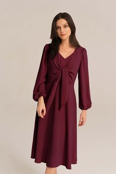 Radiate feminine charm in this dress. The delicate bow-knot detail adds a touch of sweetness, while the long sleeves provide a cozy and modest look. Perfect for any occasion, this midi dress effortlessly combines comfort and fashion.Material : 98%Polyester+2%ViscoseElasticity : NoneSku : CL2433A23*Package : 1*DressCare instructions:Do Not Bleach.Separate dark colors.Iron Low Heat. Elegant Long Sleeve Dress For Fall Brunch, Chic Long Sleeve Dresses With Bow, Chic Long Sleeve Midi Dress With Bow, Long Sleeve Dress With Bow For Fall, Long Sleeve Fall Dress With Bow, Feminine Red Midi Dress For Fall, Fall Knee-length Dresses With Bow, Long Sleeve Winter Dress With Bow, Winter Long Sleeve Dress With Bow