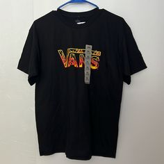 Vans Flames Shirt (18-20) Xl Vans Black Tops With Graphic Print, Black Vans Crew Neck T-shirt, Vans Black Graphic Tee, Vans Black Crew Neck T-shirt, Black Vans Tops With Graphic Print, Vans Black Top With Graphic Print, Black Crew Neck T-shirt By Vans, Black Short Sleeve Vans Tops, Black Vans Crew Neck Top