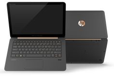 two laptops side by side with one open and the other closed, on top of each other