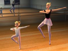 two young ballerinas are dancing in a dance studio