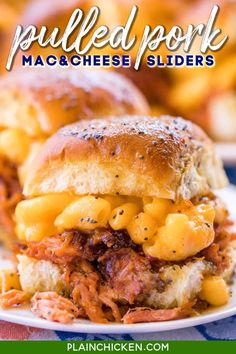 pulled pork cheese sliders on a plate with macaroni and cheese in the background